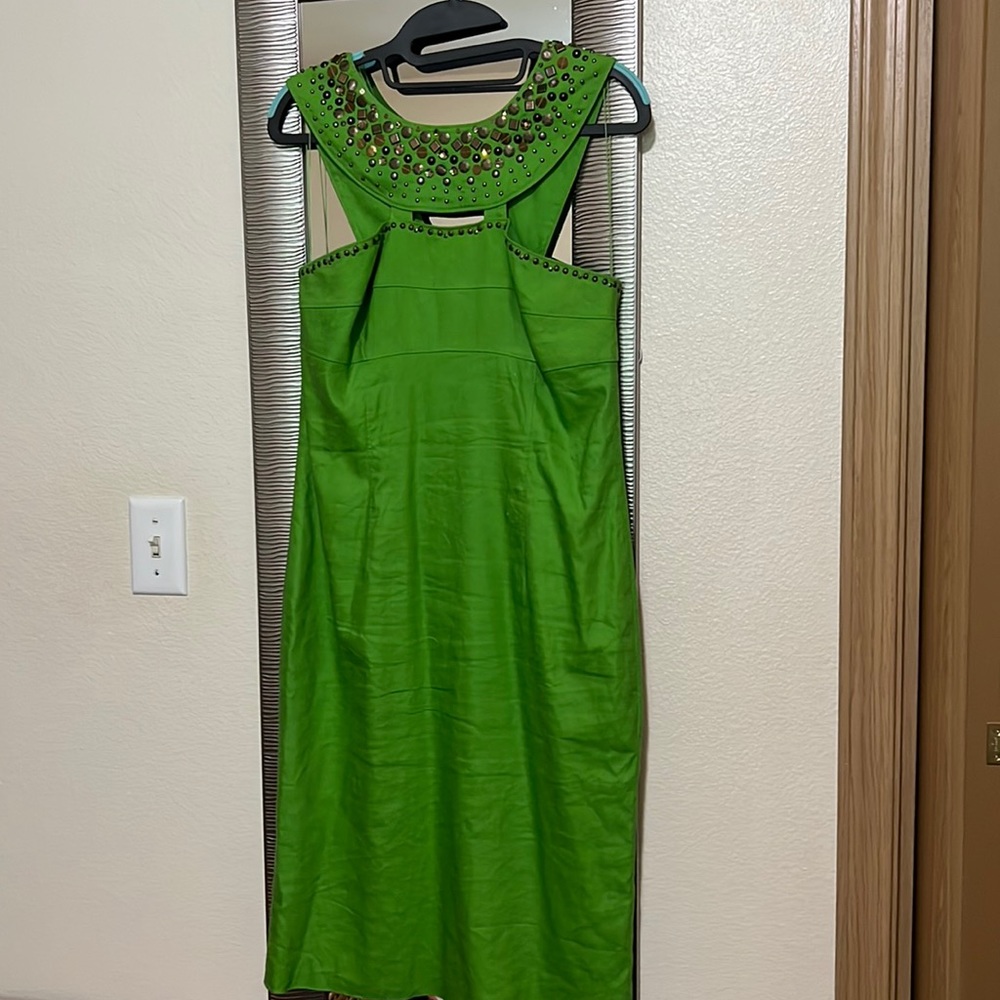 Beautiful midi dress with embellished neckline